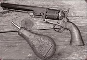 Colt 1851 Navy with powder flask