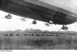 R33 with Gloster Grebe fighters in 1926.