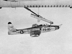 A Republic F-84E on FICON trapeze